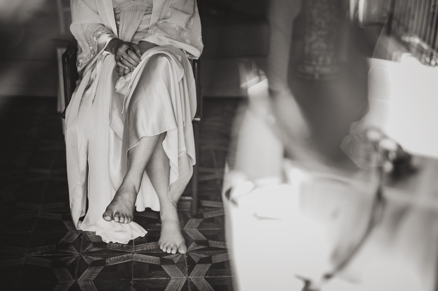 Black and white detail of a bride during wedding preparations