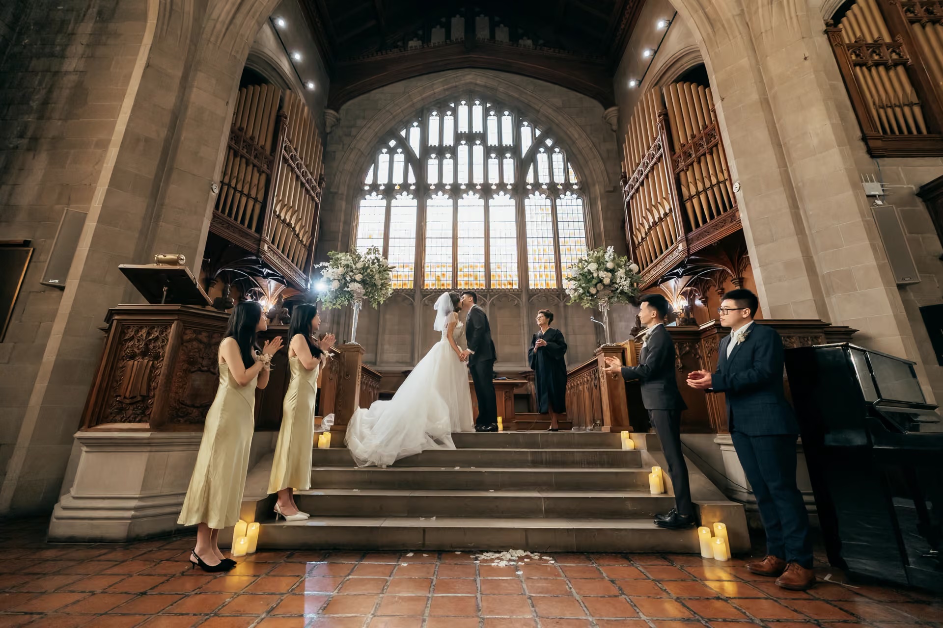 Bride and groom kissing during their church ceremony